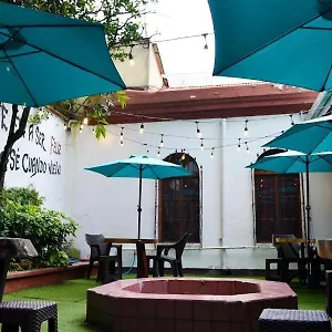 4 Grados Hostal Couette-café